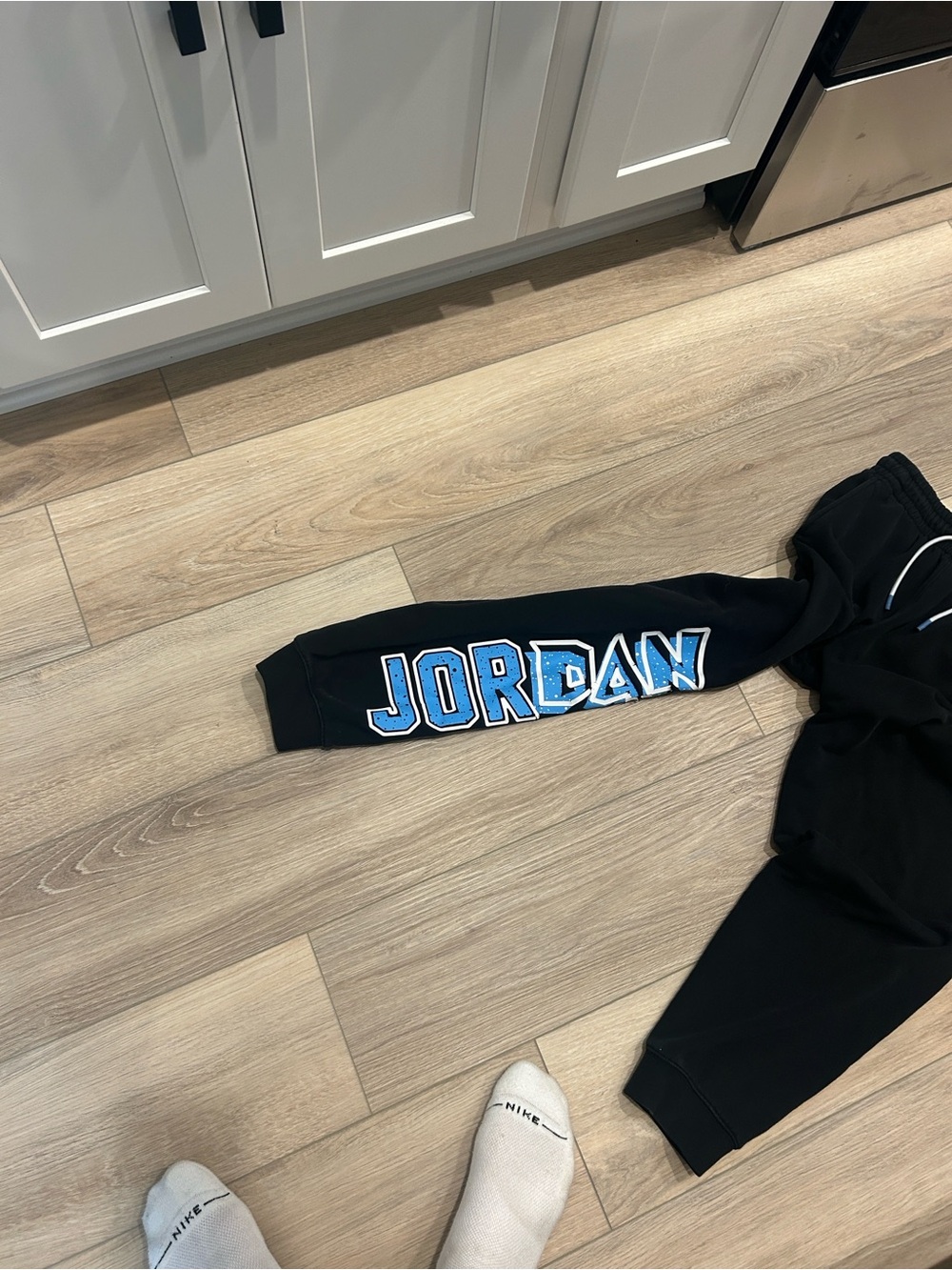 Jordan Kids Black Sweatpants with Light Blue Lettering